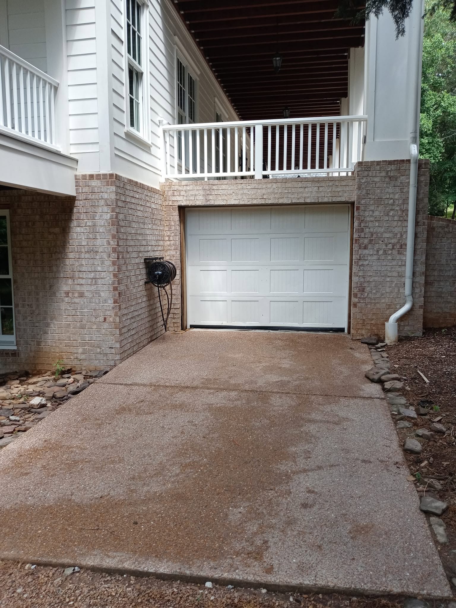Aggregate driveway after professional concrete cleaning